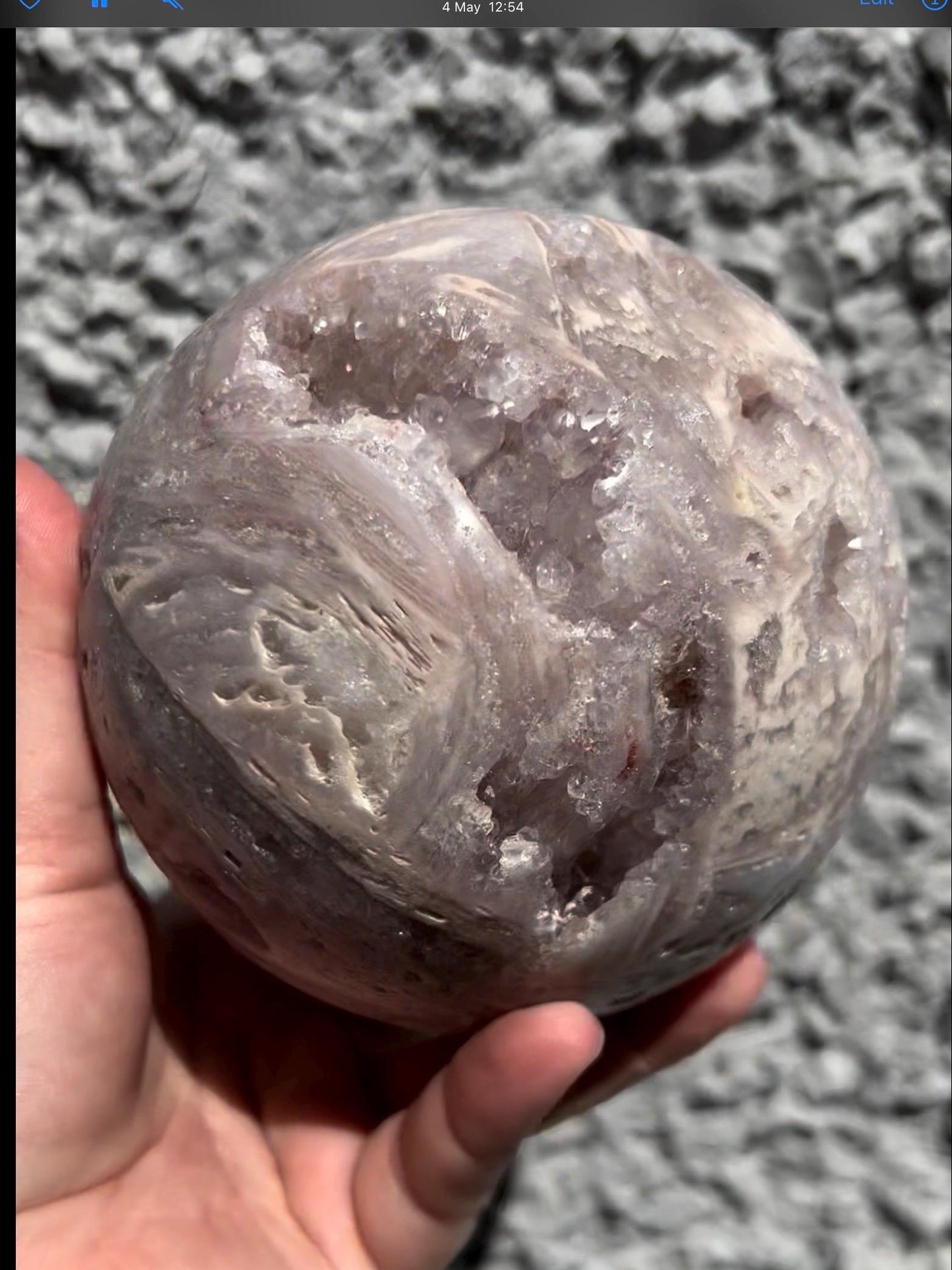 large, statement pink amethyst sphere with rutile formations in lilac tones over 1kg