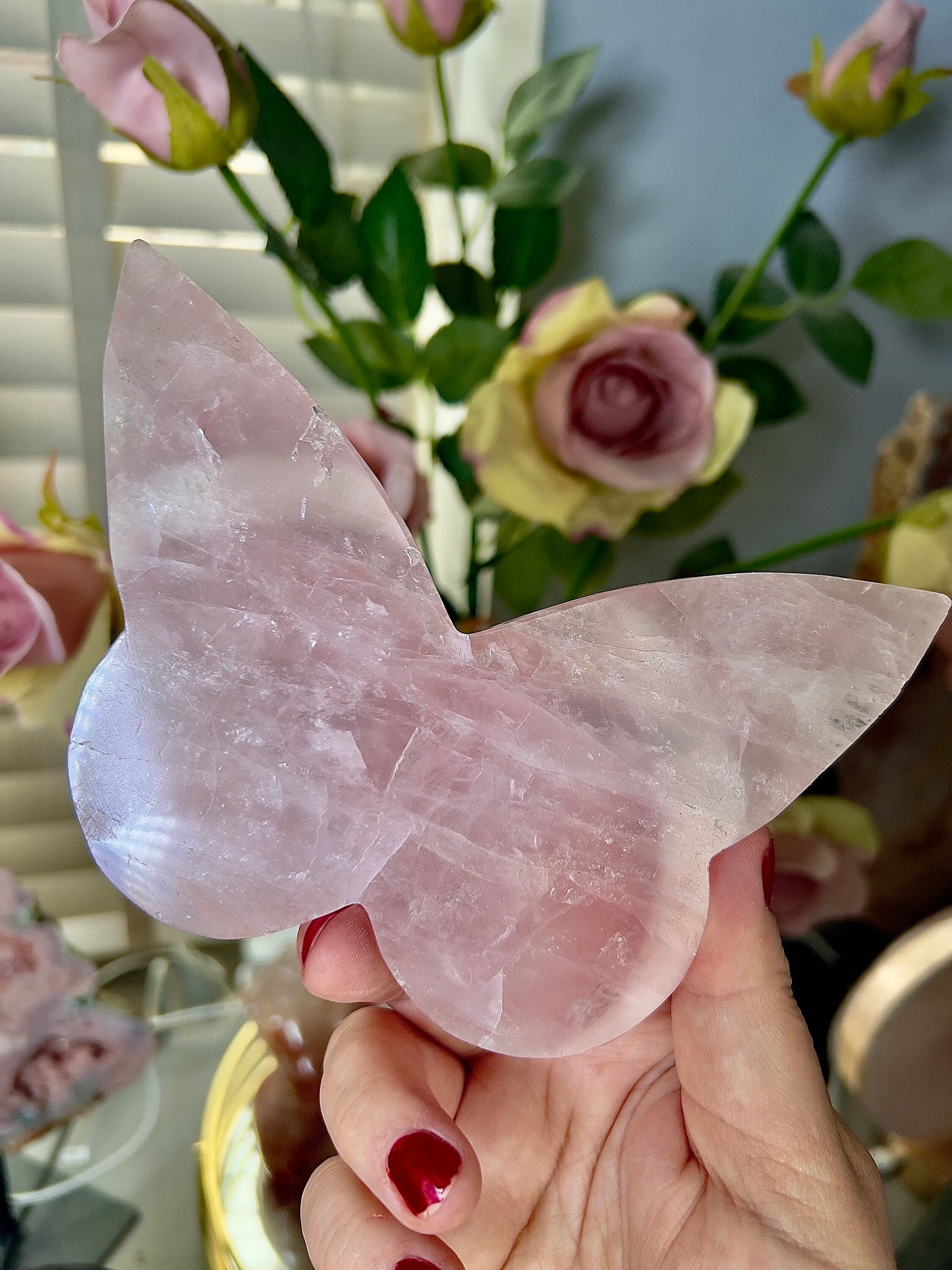 High grade, rose quartz butterfly with gold pedestal stand