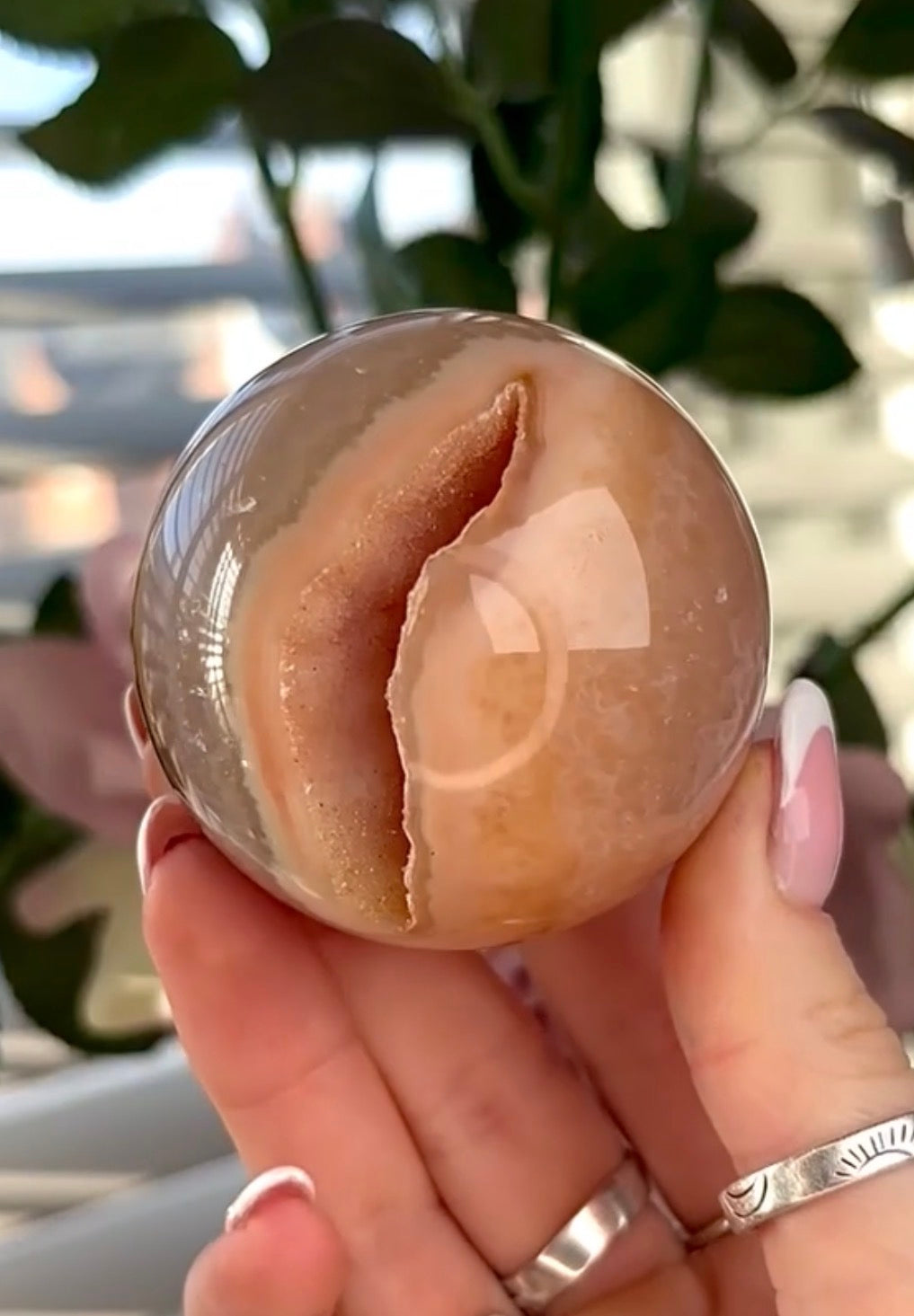 Gorgeous, high grade, agate sphere in orange/peach tones
