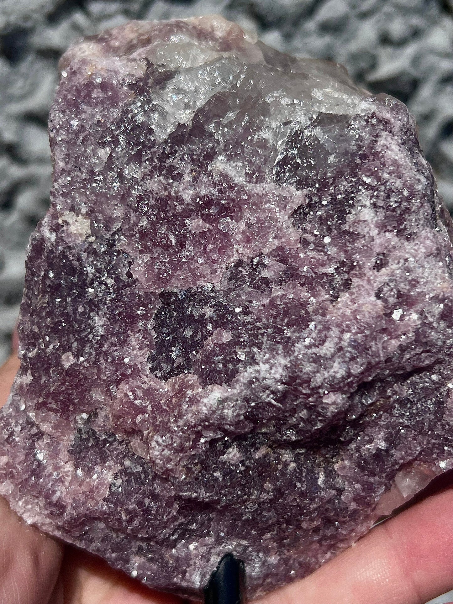 Rough lepidolite on stand