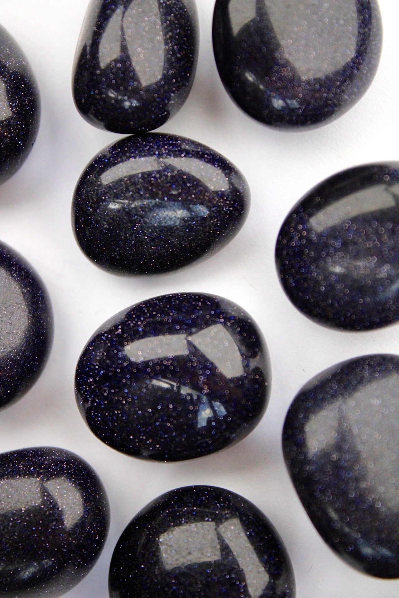 Blue sandstone, goldstone tumble stone