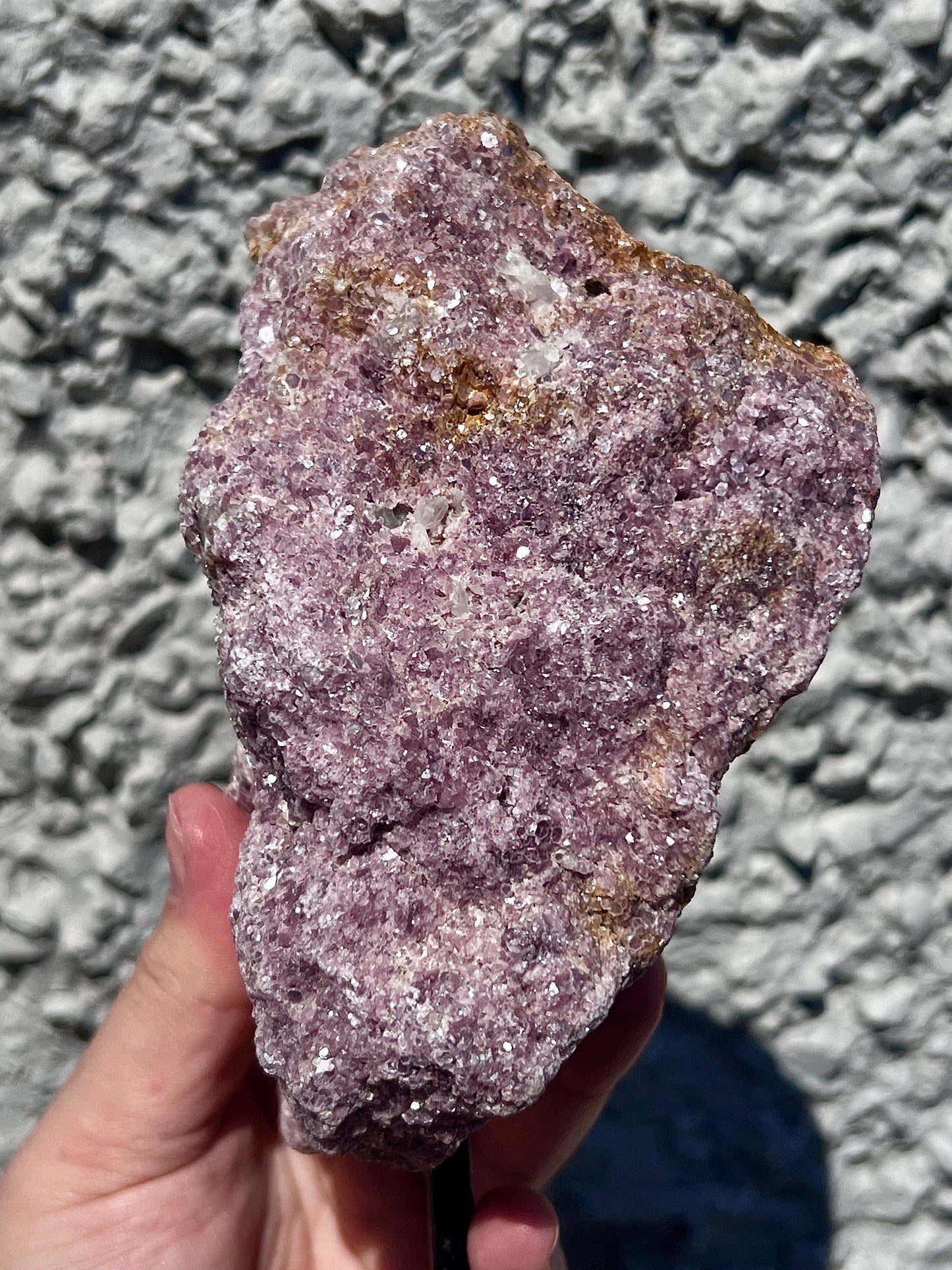 Rough lepidolite on stand