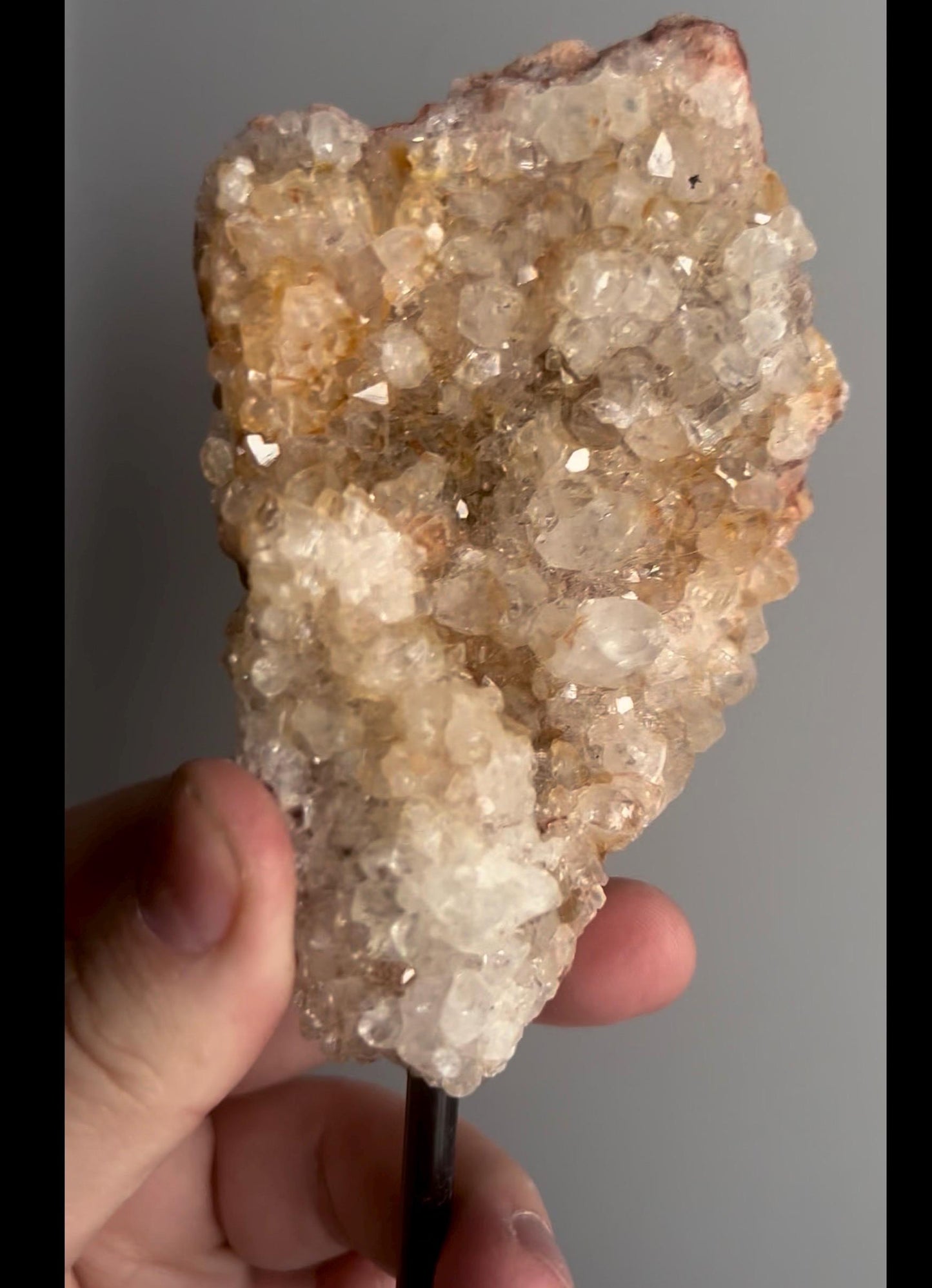 High grade, pink amethyst geode on stand with high clarity quartz teeth