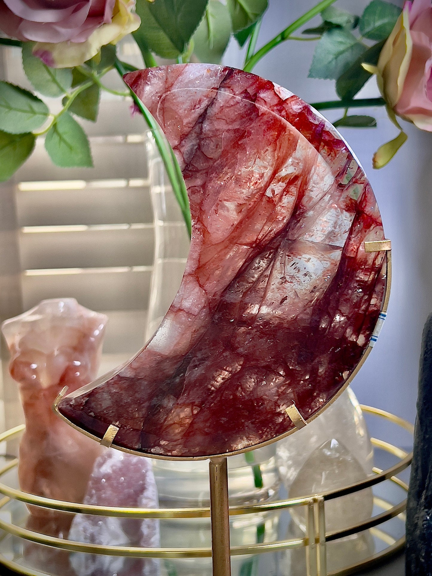 large, high grade, red fire quartz moon on stand