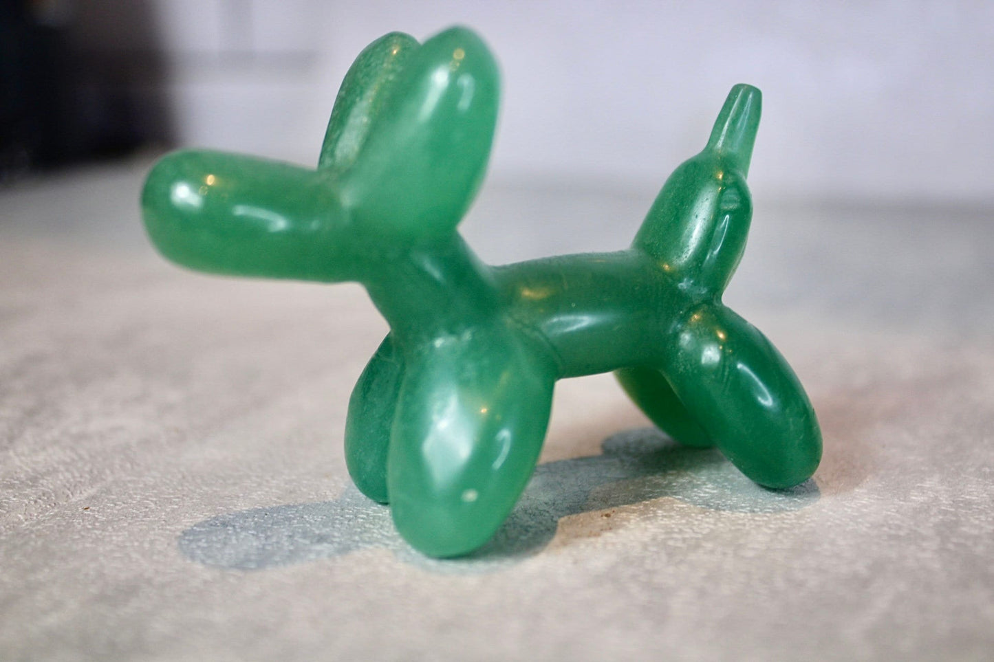 Green, strawberry quartz, balloon dog, carving 5.5 (h) 8cm (L)