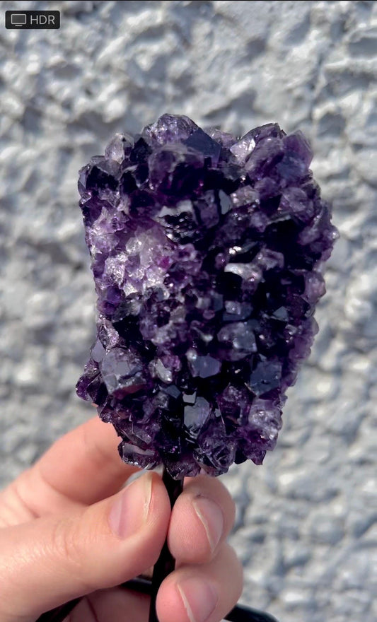 amethyst cluster on stand