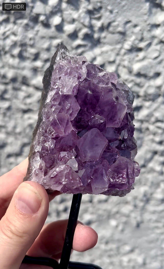 amethyst cluster on stand