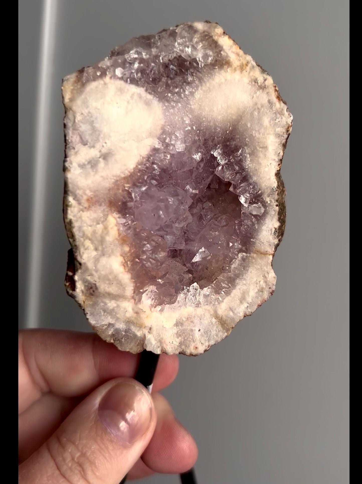 High grade, pink amethyst geode on stand with purple druzy