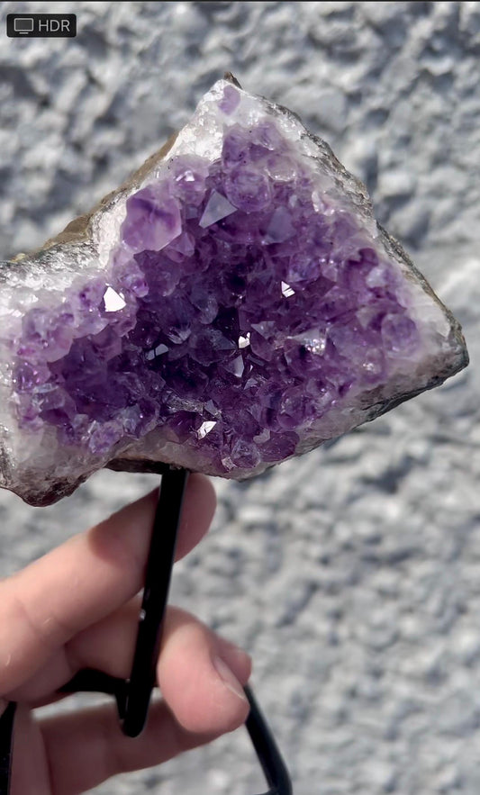 amethyst cluster on stand