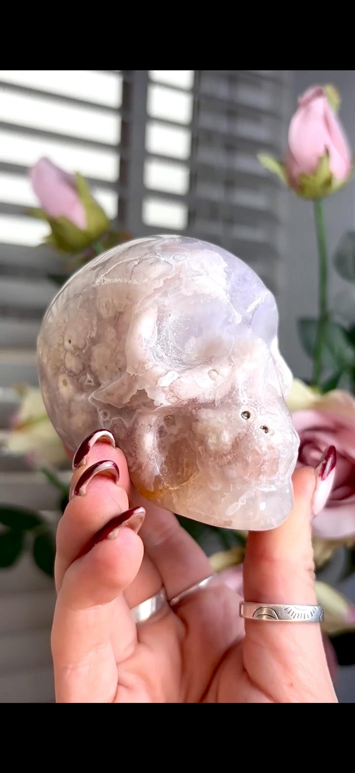 Flower agate skull in pink & blue tones