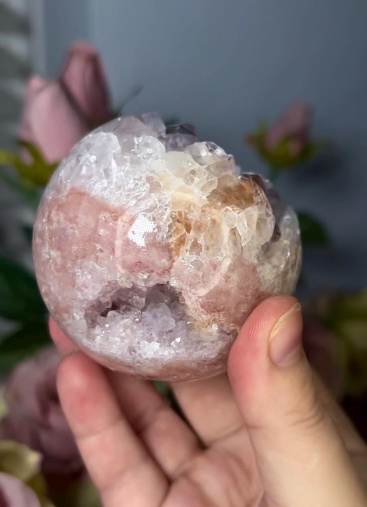 High grade, pink amethyst sphere with high clarity, rainbow, quartz teeth 429g