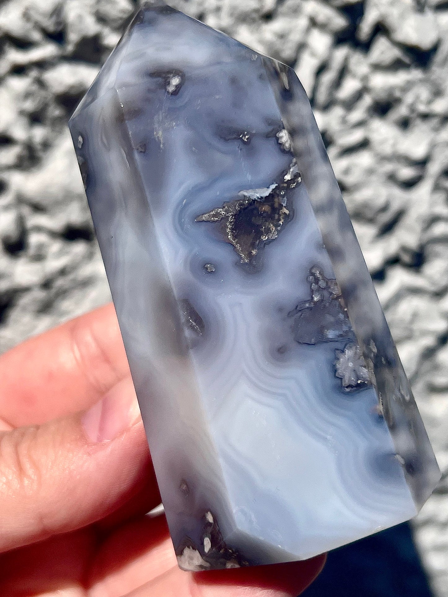 Black/grey/blue flower agate tower with banding and quartz 254g 11cm