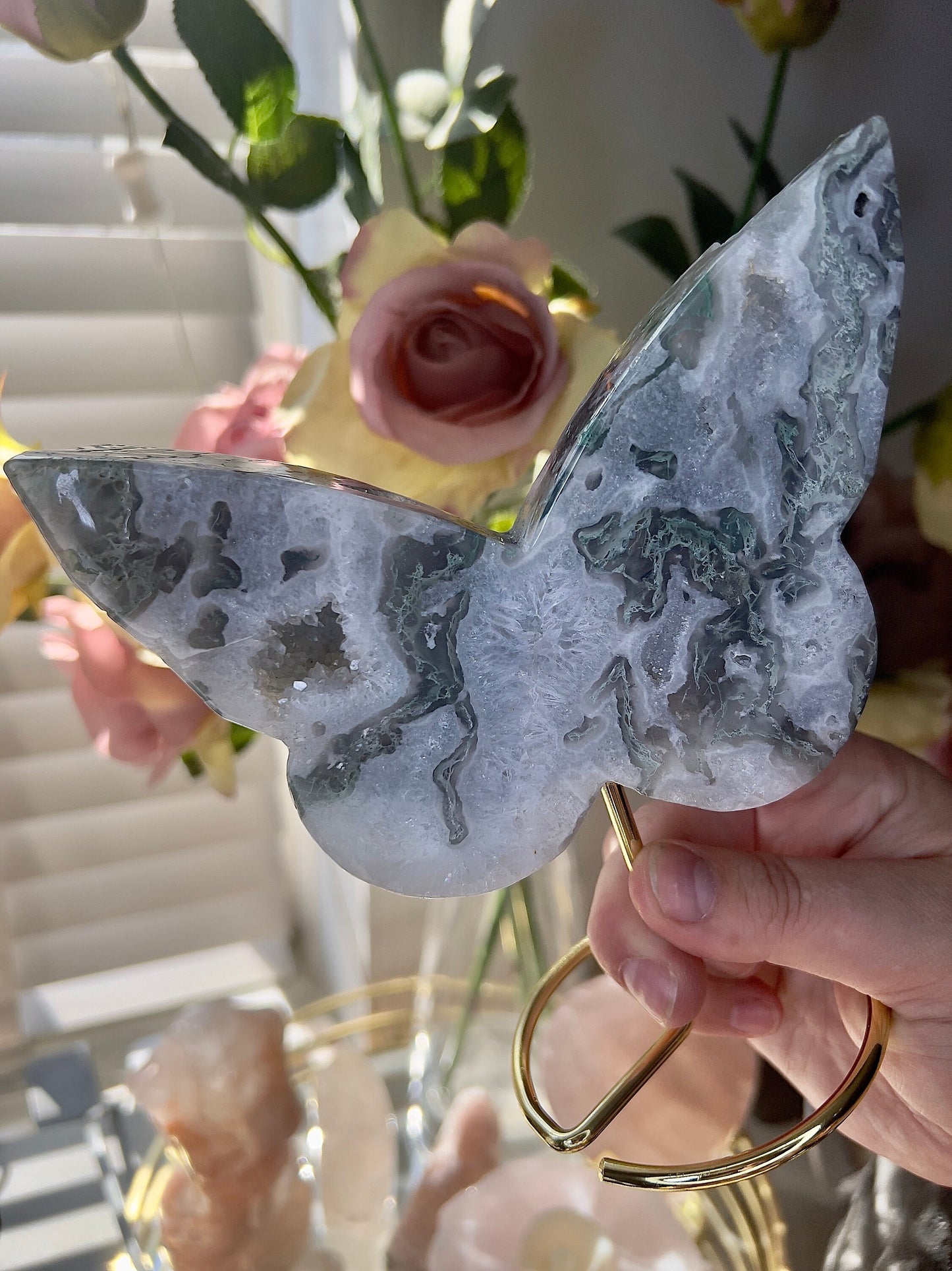 High grade, moss agate butterfly with gold pedestal stand
