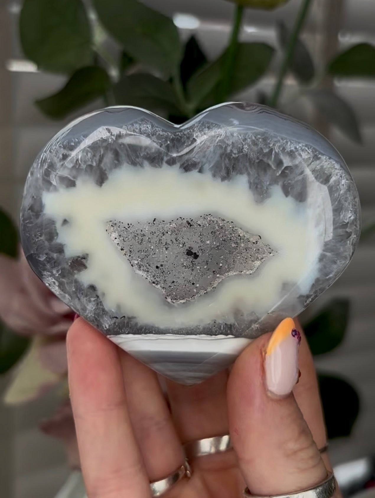 Beautiful, high grade, banded agate heart with druzy - comes with stand