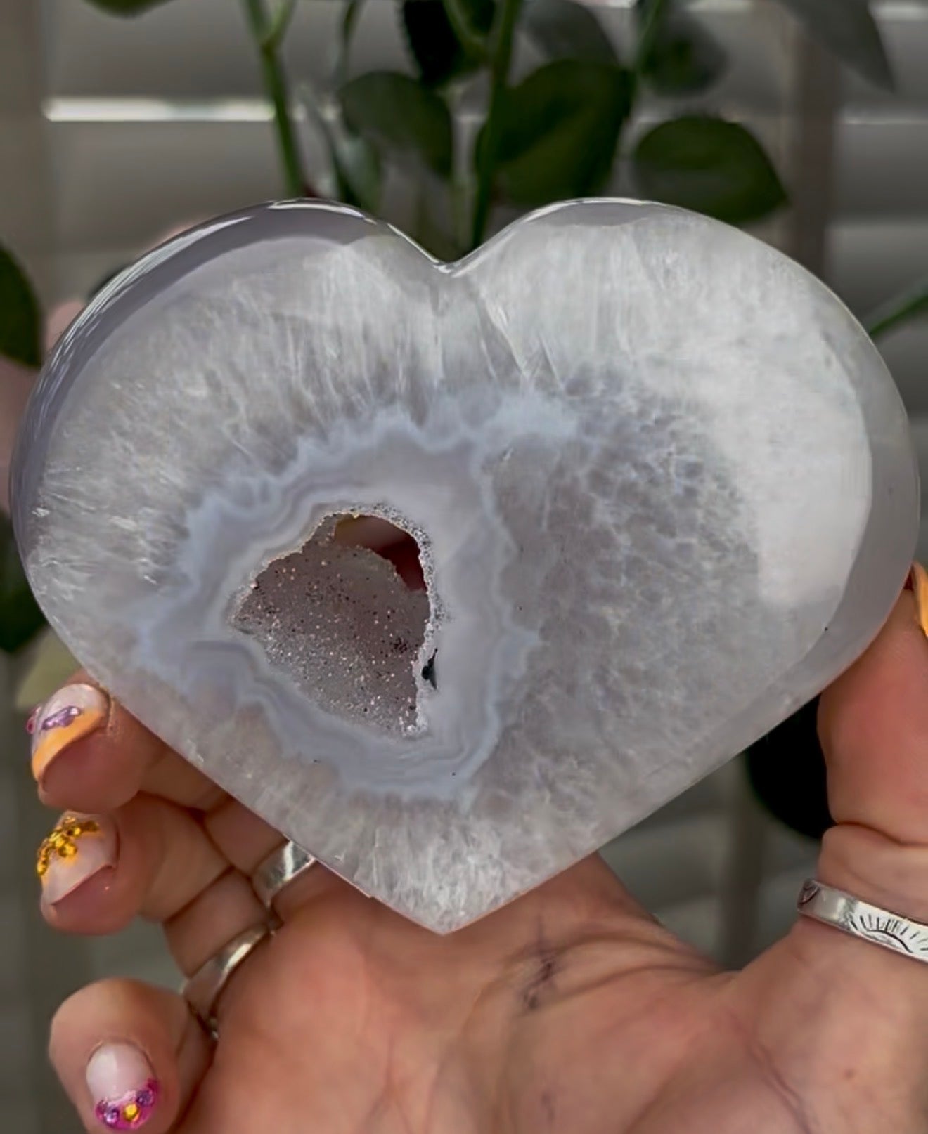 Beautiful, high grade, agate heart with druzy - comes with stand