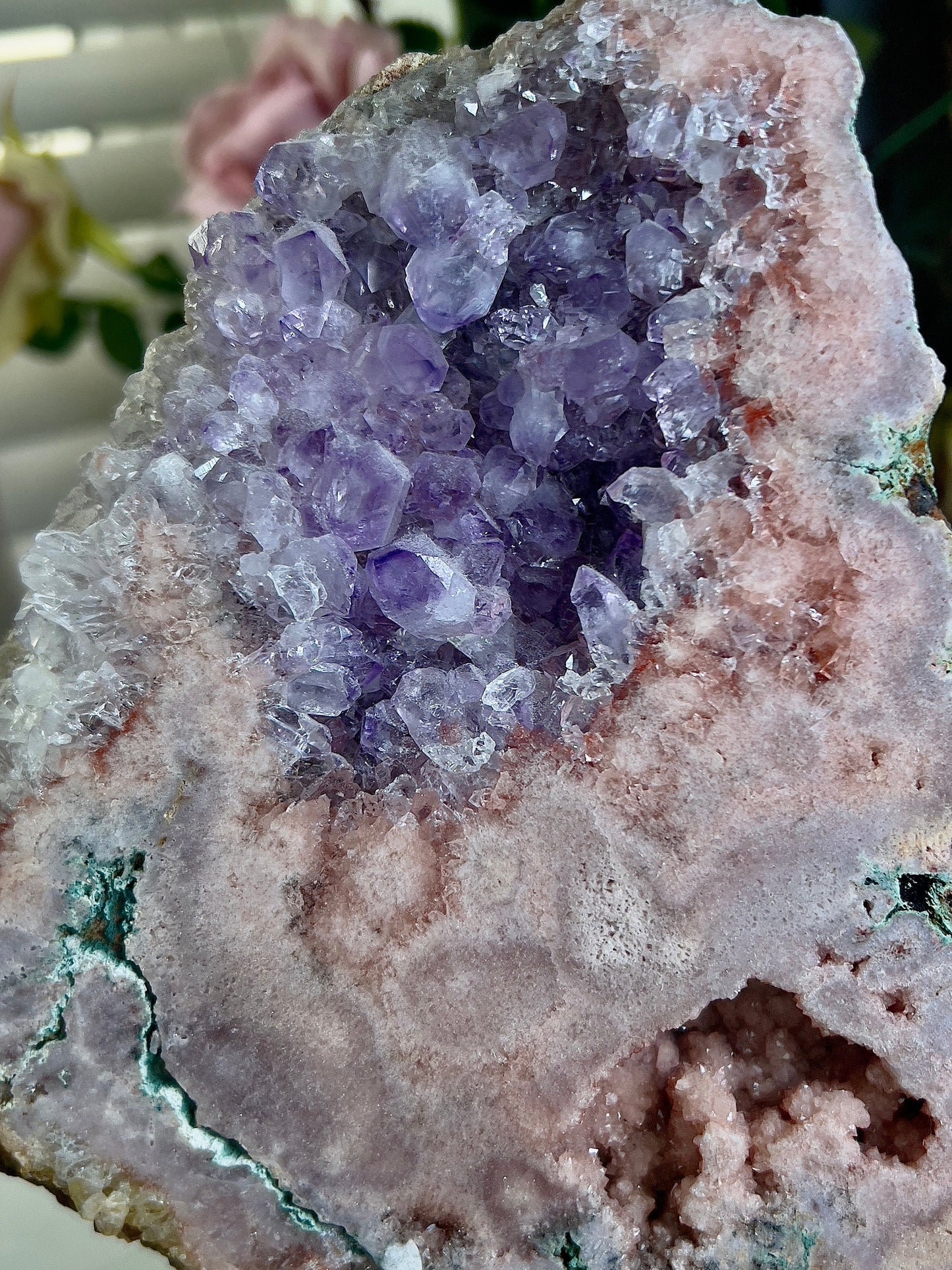 Extra high grade, pink amethyst slab on stand with purple quartz