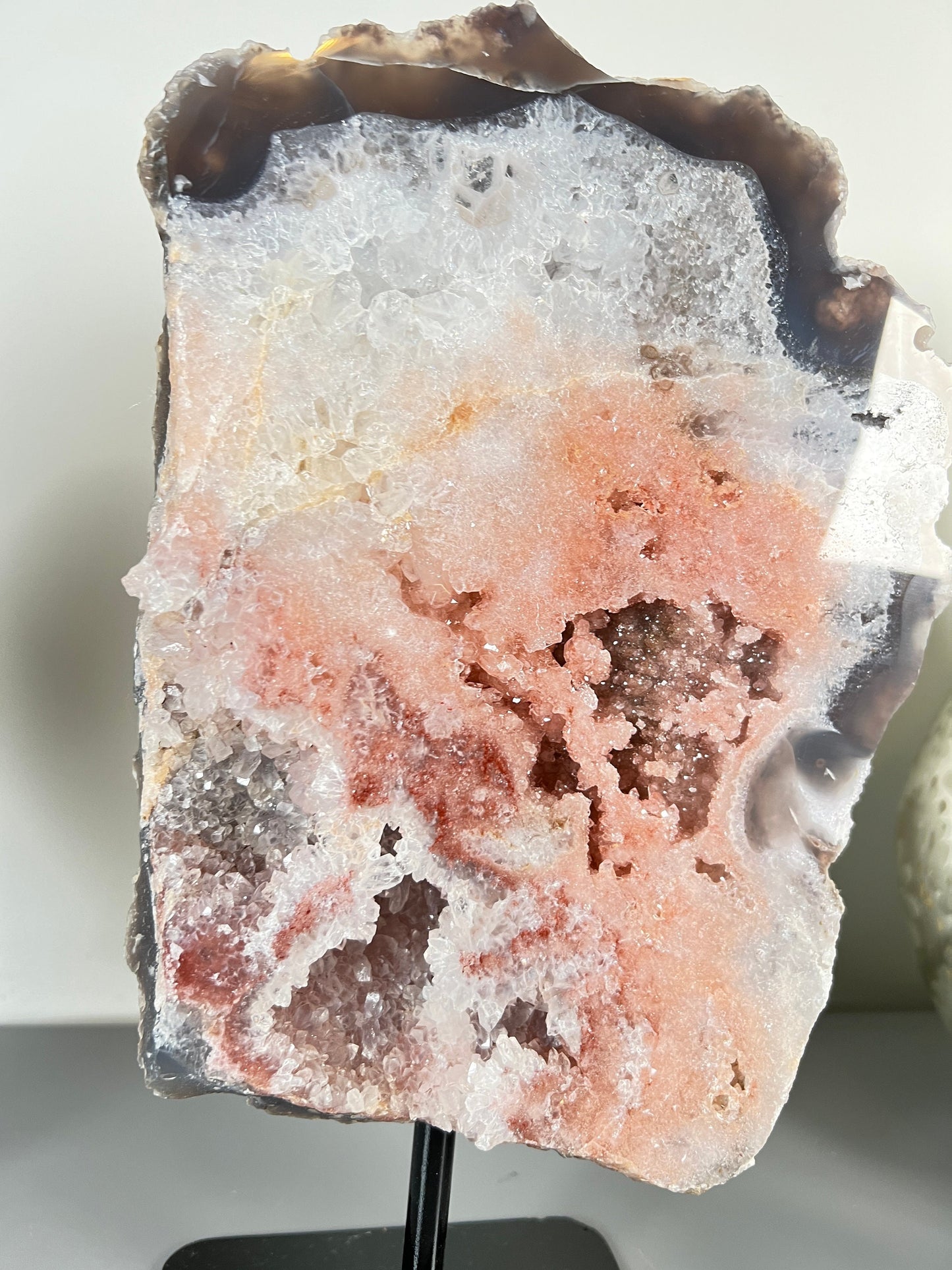 Peach, pink amethyst slab on stand  with smoky, clear and red crystallisation