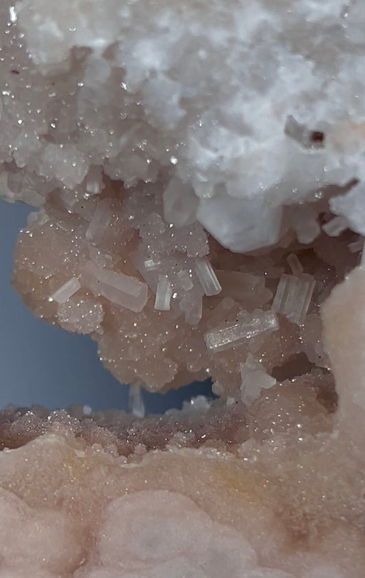 High grade, round pink amethyst slab with green jasper edging & rare cubic calcite inclusions