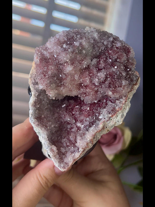 high grade, pink amethyst geode with red and pink toned sugar druzy stand