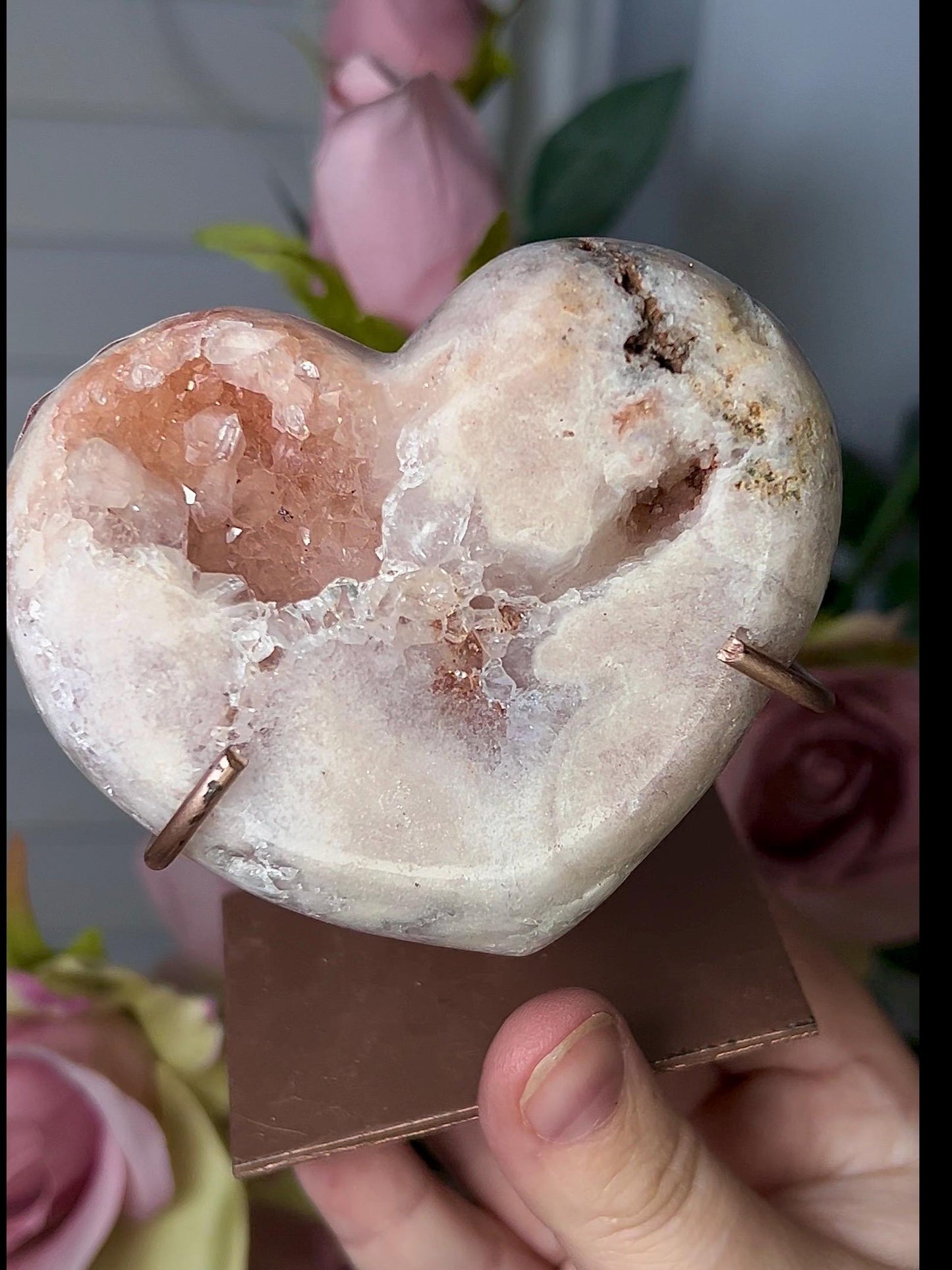 Beautiful, pink amethyst heart in peach tones with stand