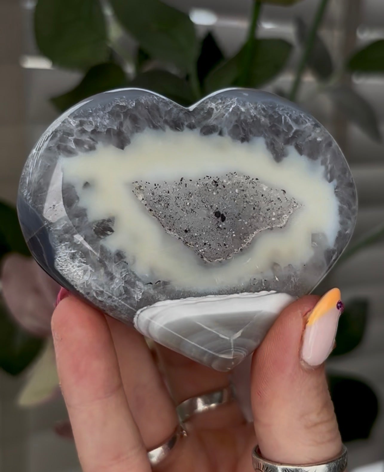 Beautiful, high grade, banded agate heart with druzy - comes with stand