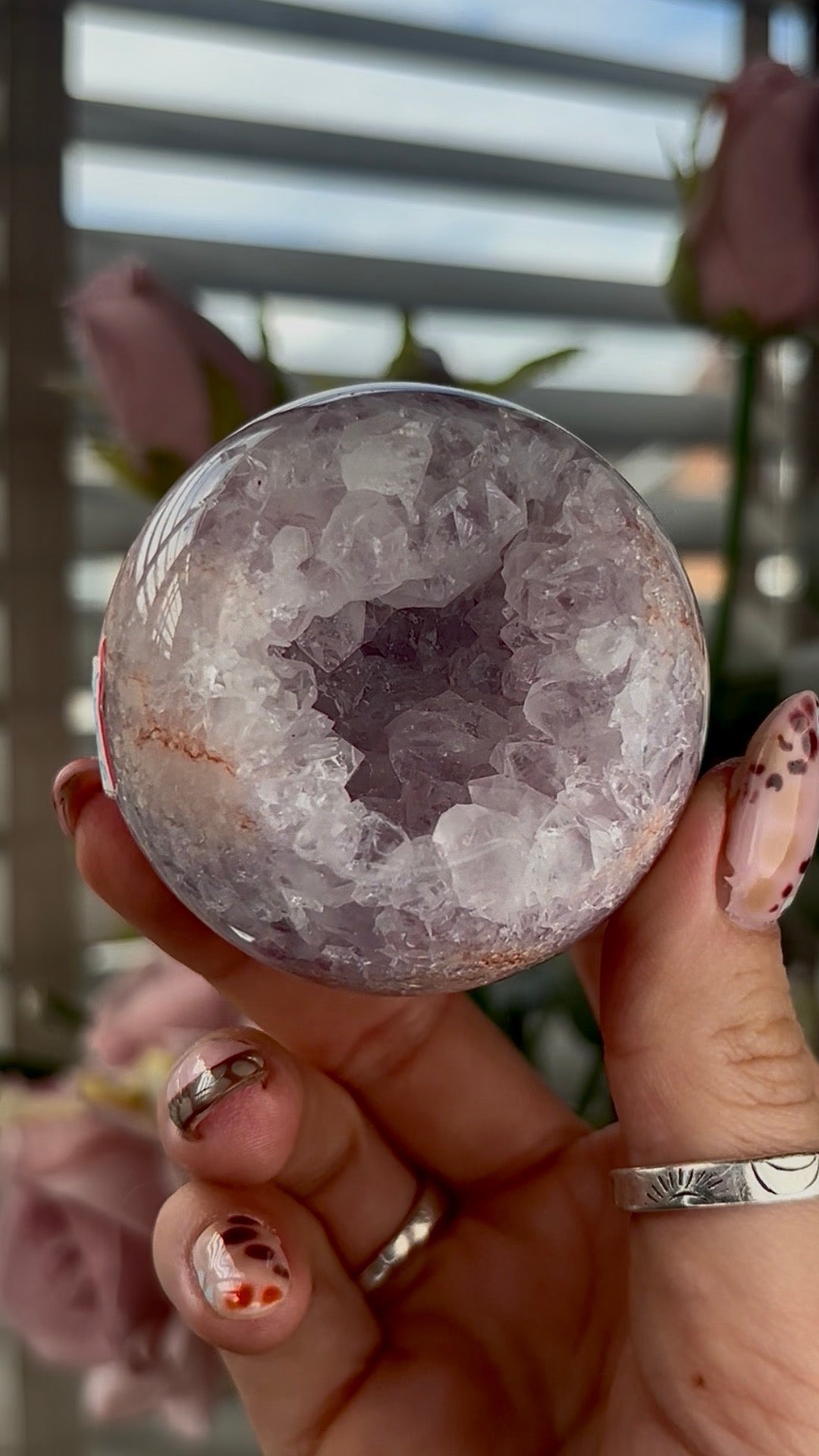High grade, amethyst Flower agate sphere with high clarity quartz