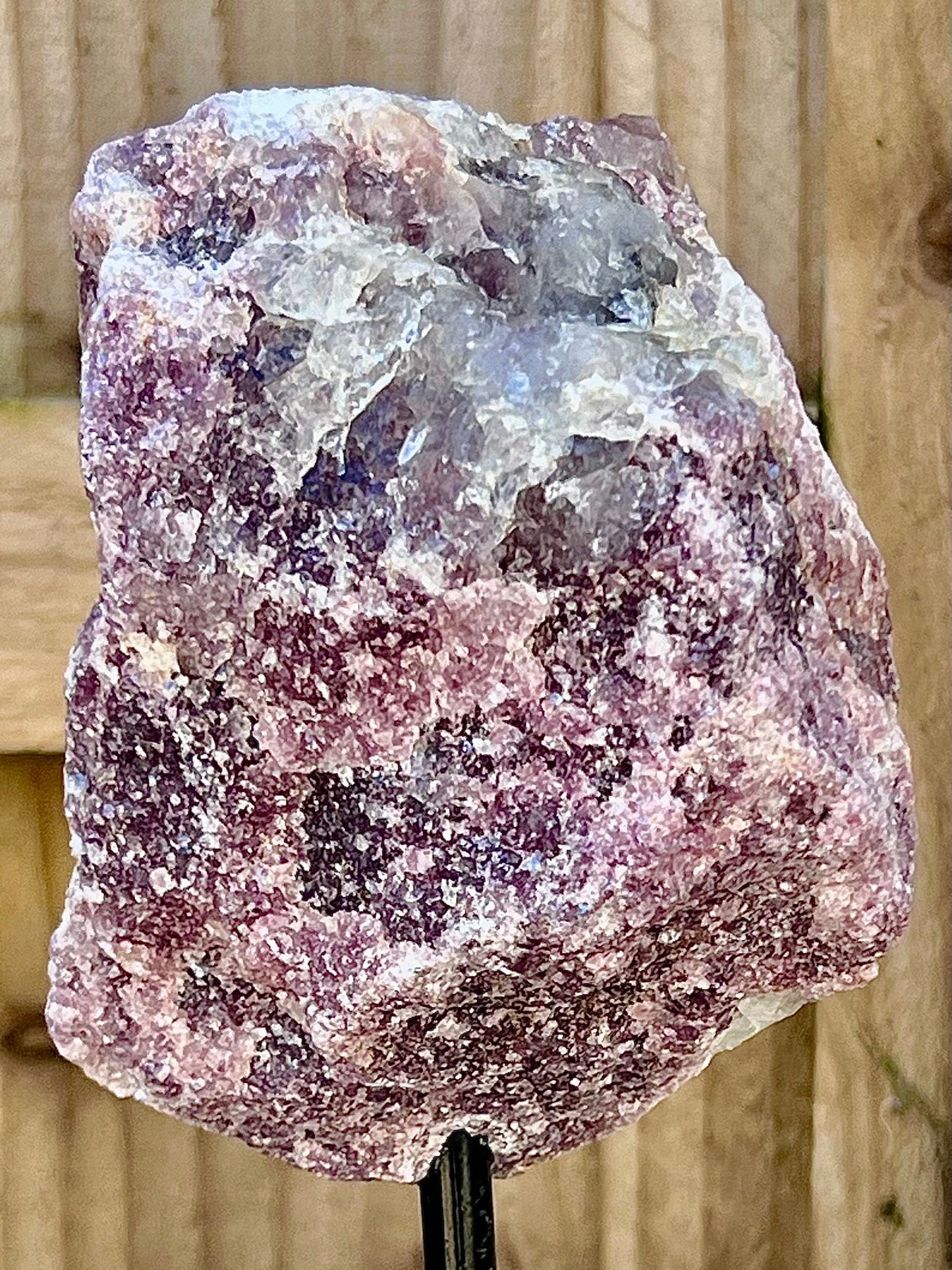 Rough lepidolite on stand
