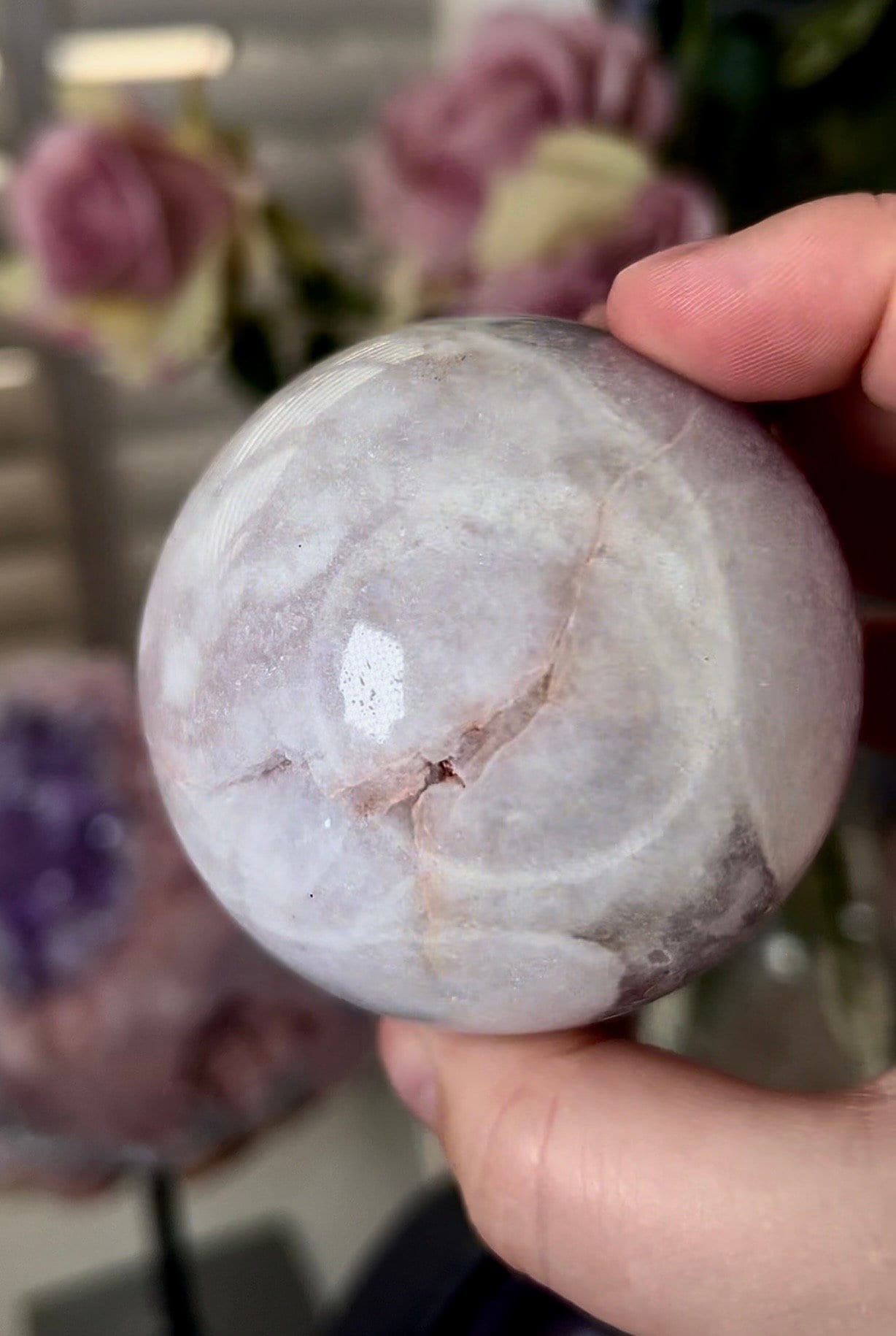 light pink amethyst sphere with chunky, druzy, teeth 380g