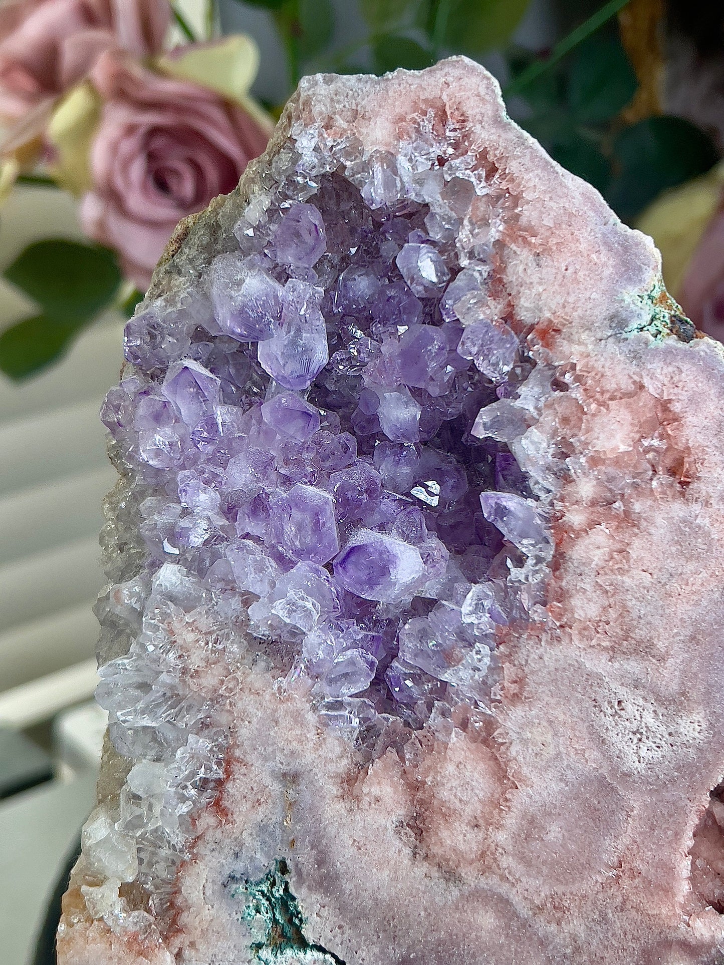 Extra high grade, pink amethyst slab on stand with purple quartz