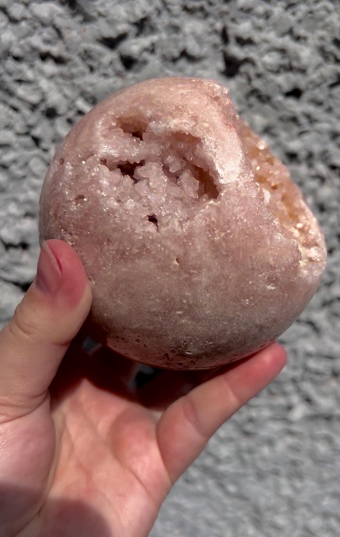 large, vibrant peach toned pink amethyst sphere with sugar druzy cave 1.173kg