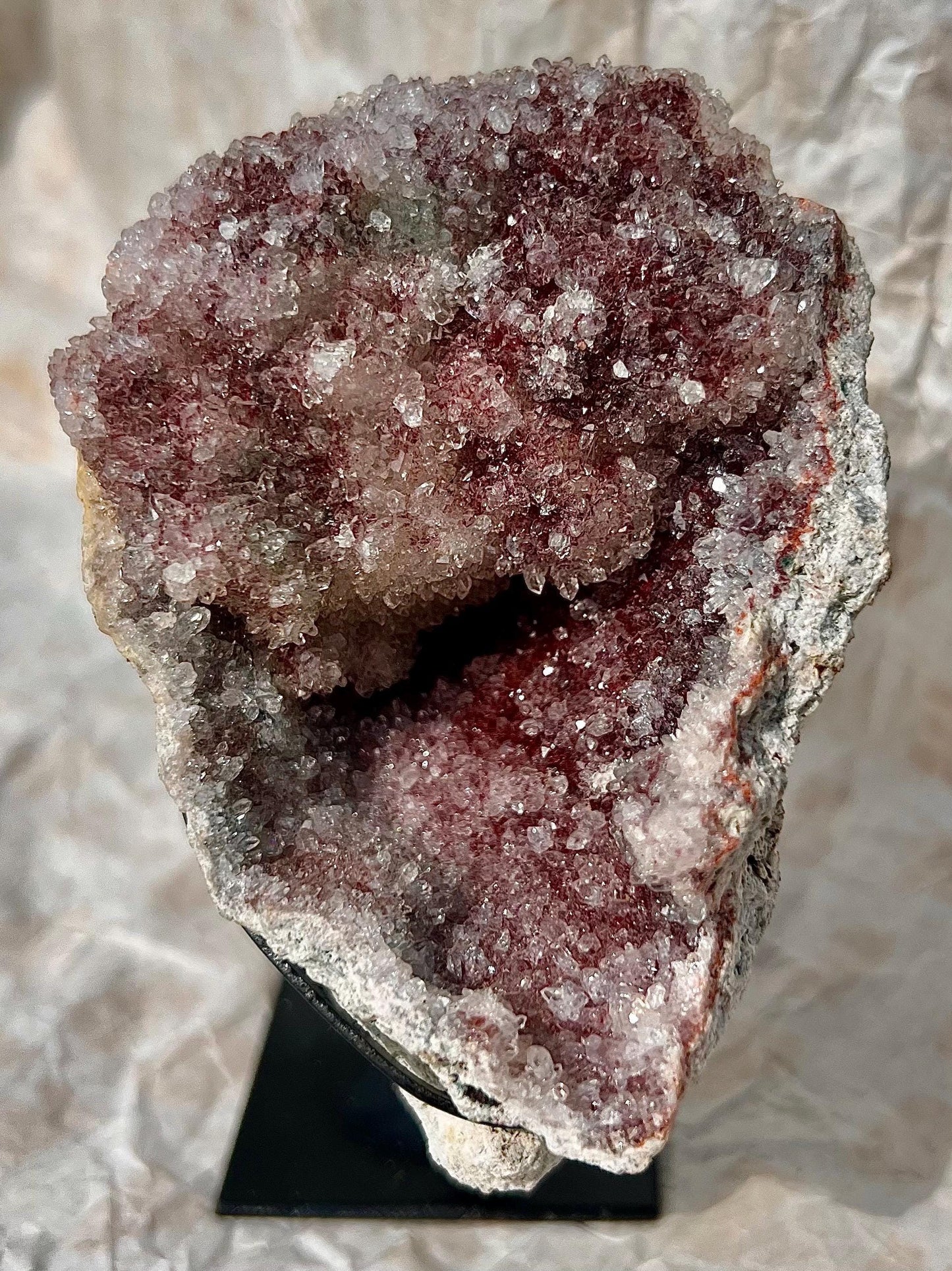 high grade, pink amethyst geode with red and pink toned sugar druzy stand