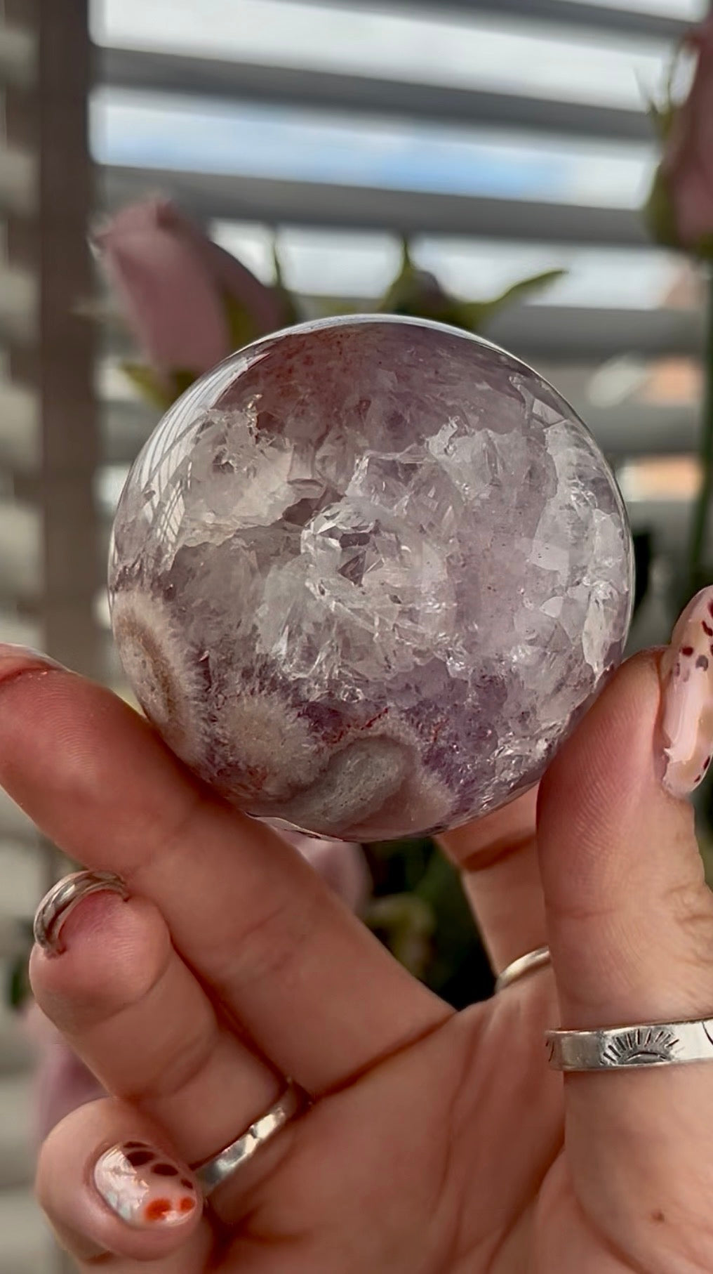 High grade, amethyst Flower agate sphere with high clarity quartz