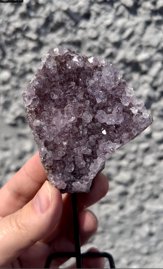 amethyst cluster on stand