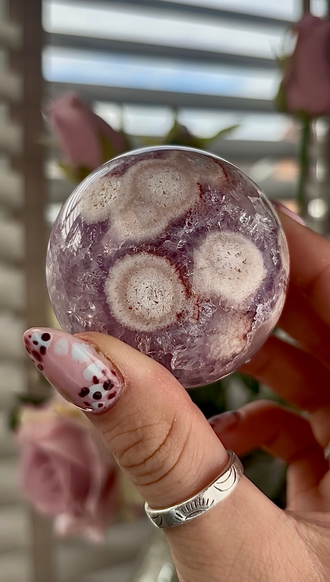 High grade, amethyst Flower agate sphere with high clarity quartz