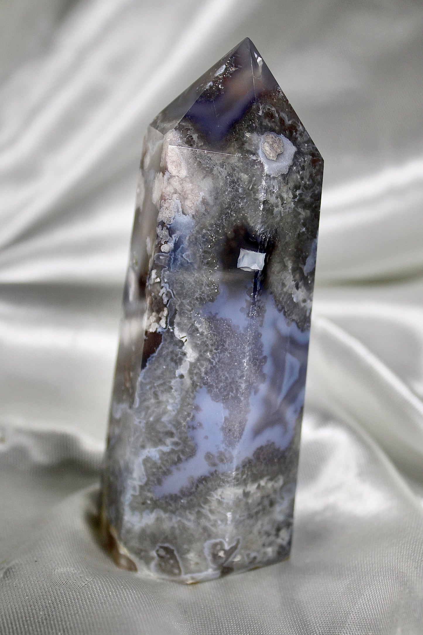Black/grey/blue flower agate tower with banding and quartz 254g 11cm