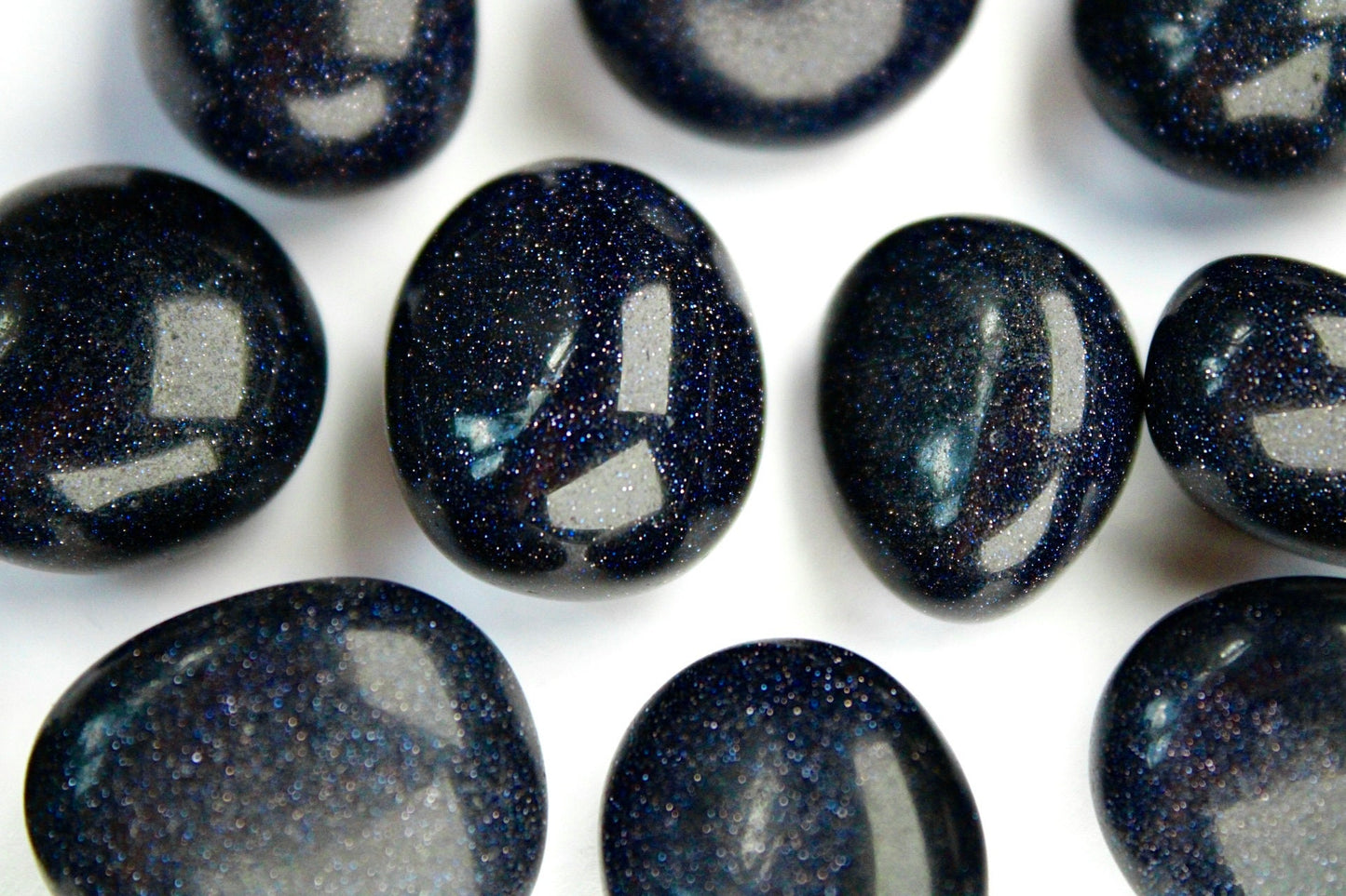 Blue sandstone, goldstone tumble stone