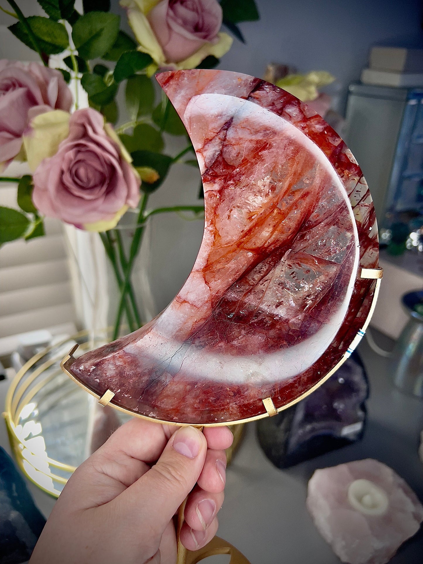 large, high grade, red fire quartz moon on stand