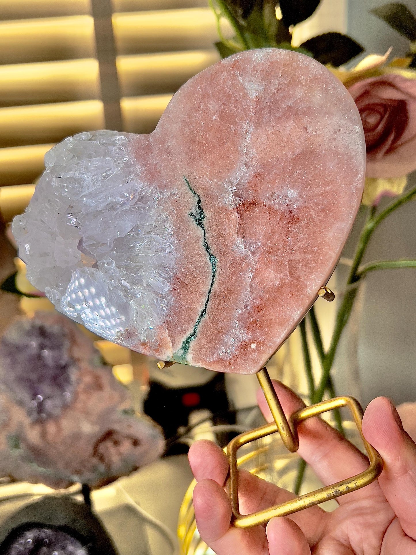 High quality, peach toned, pink amethyst heart with incredible quartz full of rainbows & green jasper vein, on gold stand 766g