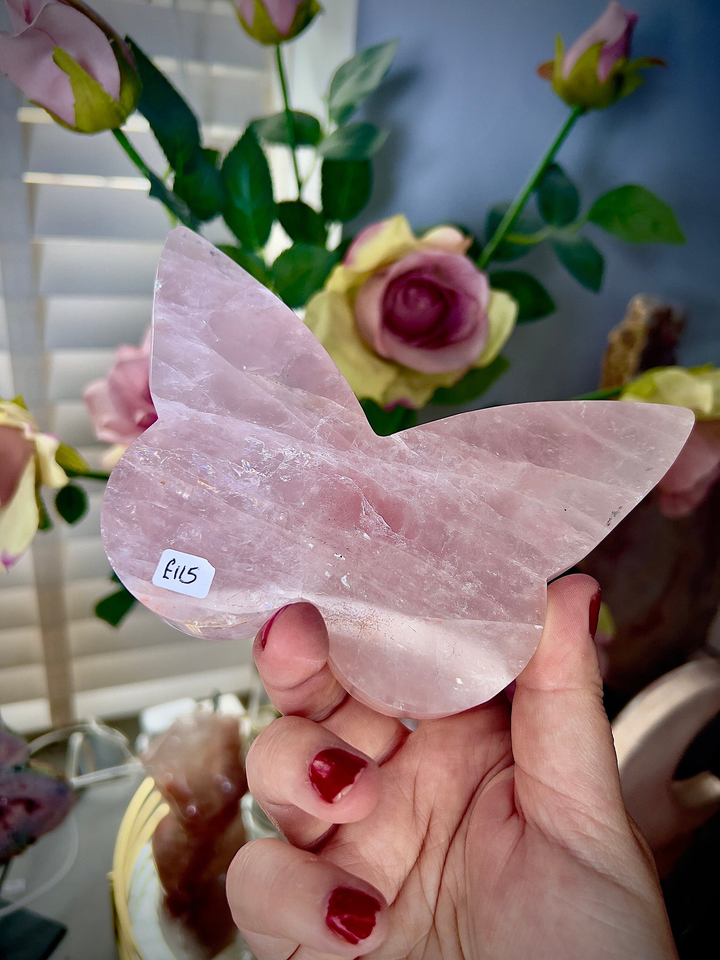 High grade, rose quartz butterfly with gold pedestal stand