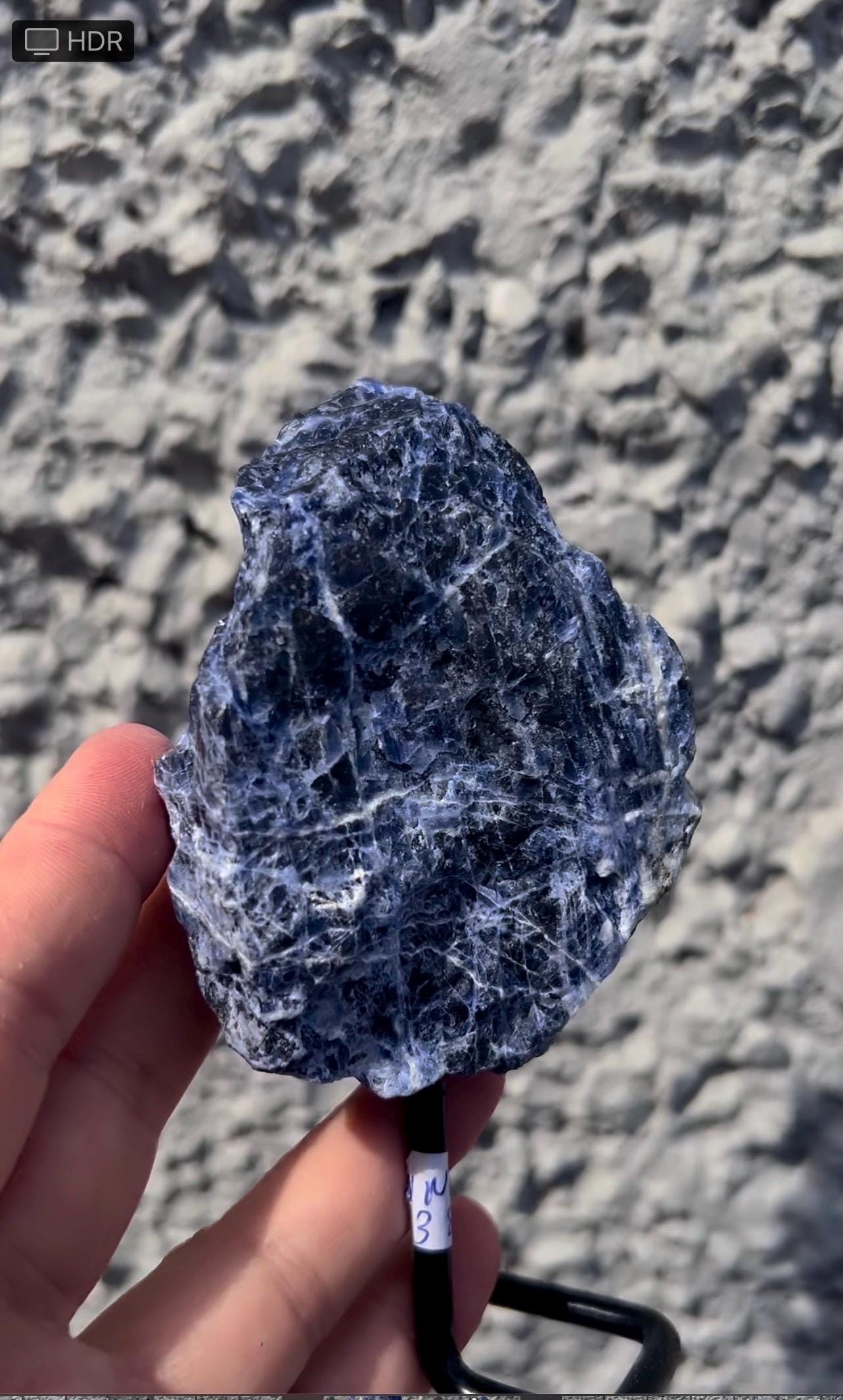 Rough Blue sodalite on stand