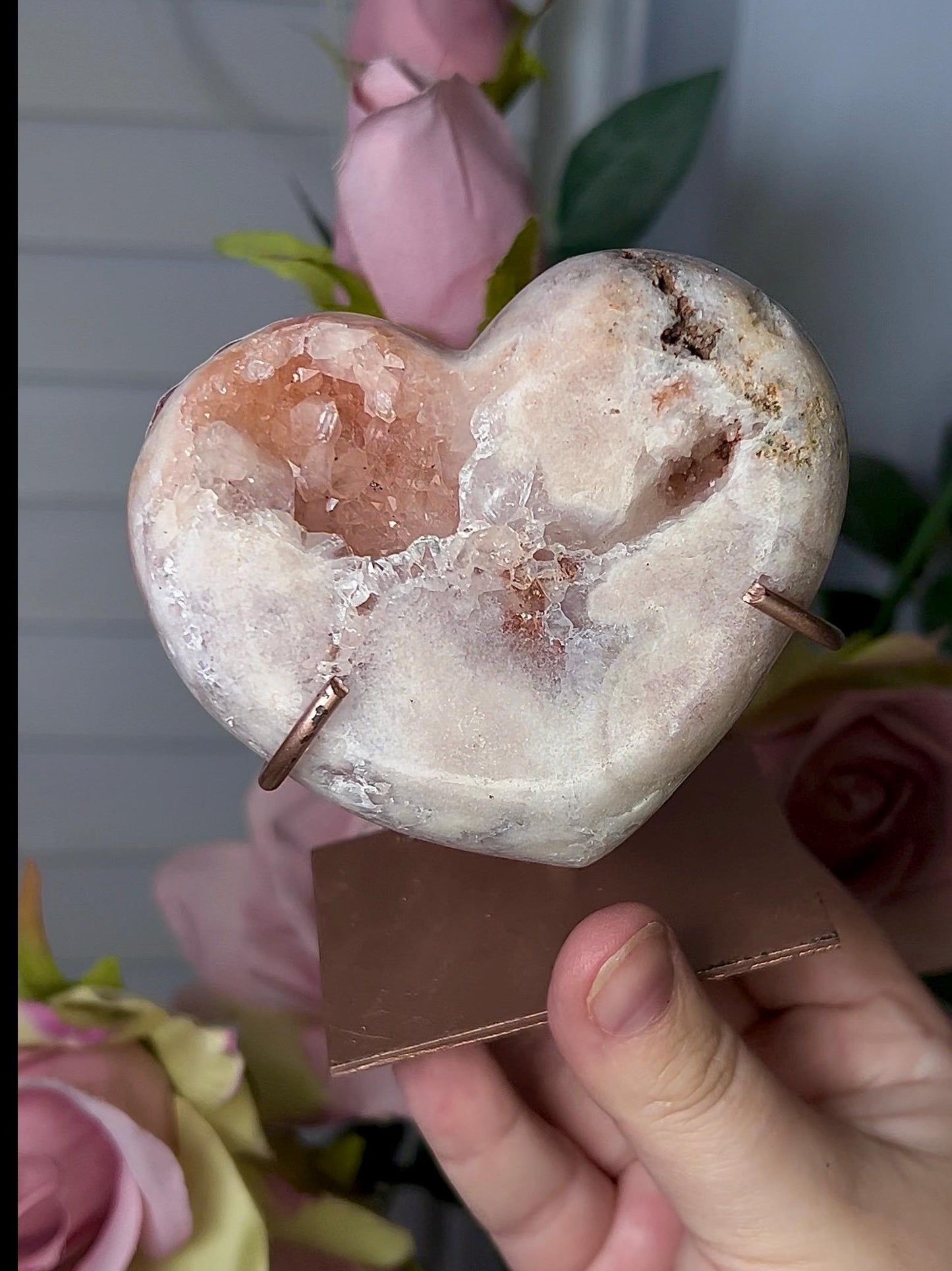 Beautiful, pink amethyst heart in peach tones with stand