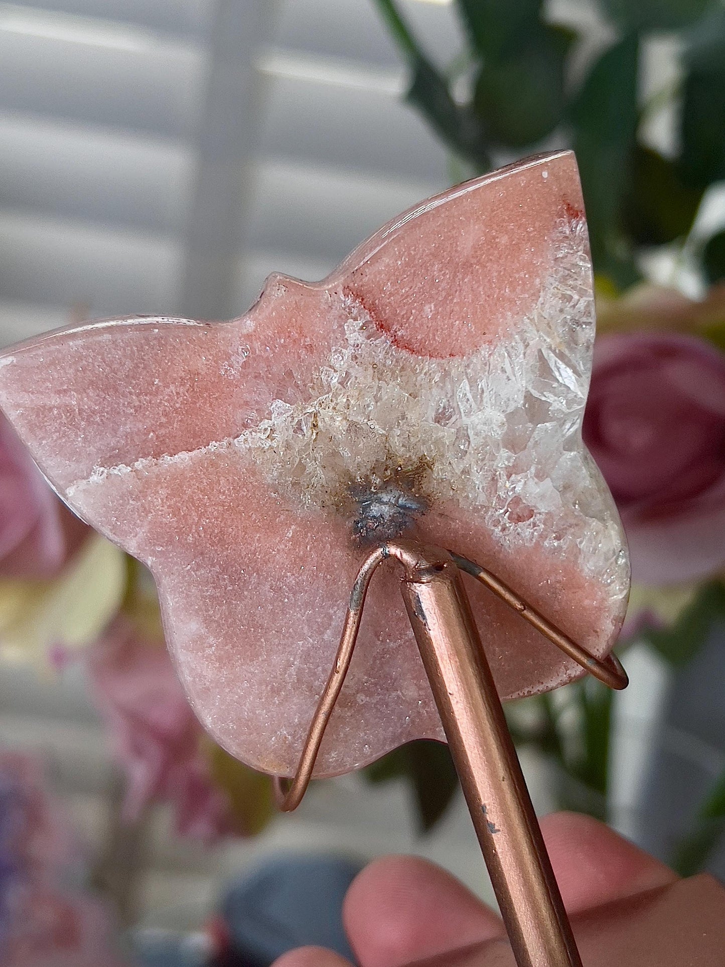 Pink amethyst butterfly in a peach tone with flower on stand
