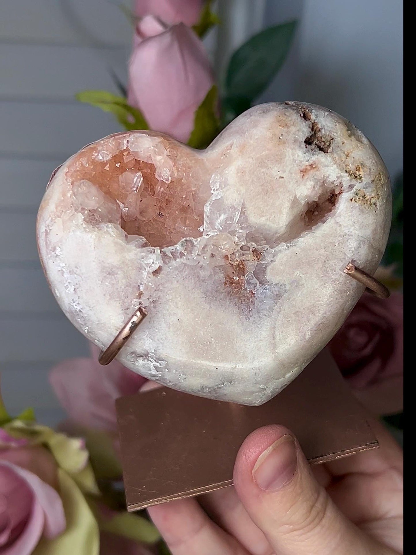 Beautiful, pink amethyst heart in peach tones with stand