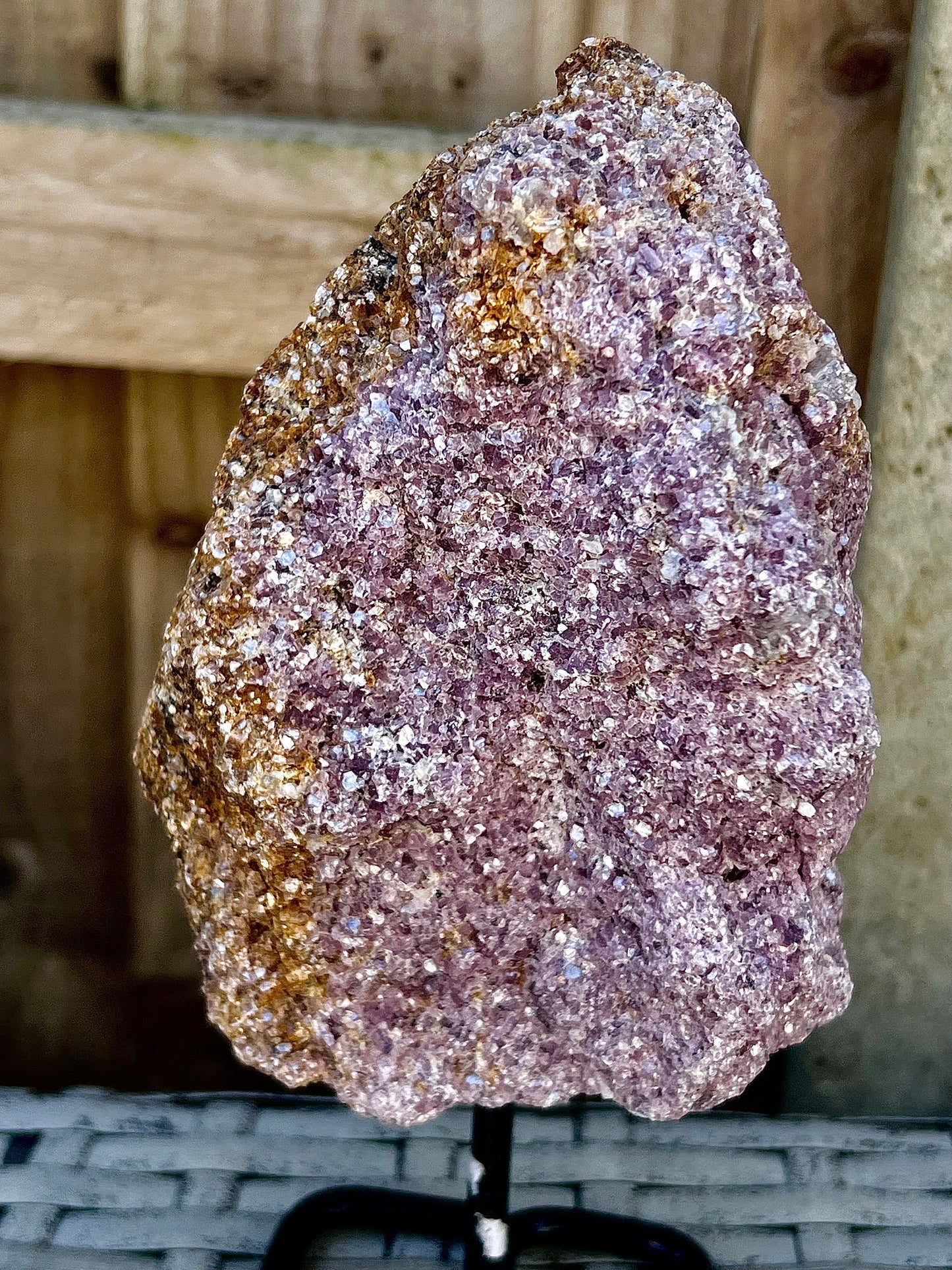 Rough lepidolite on stand