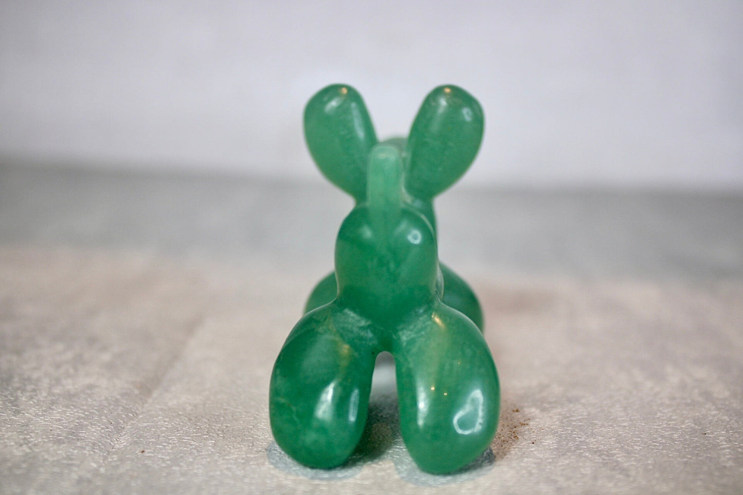 Green, strawberry quartz, balloon dog, carving 5.5 (h) 8cm (L)