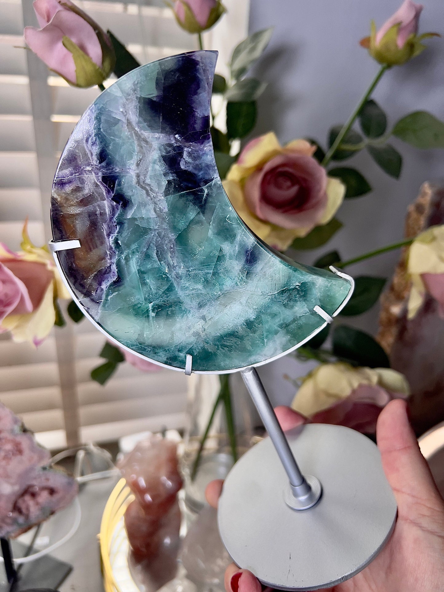 High grade, fluorite moon on silver custom stand