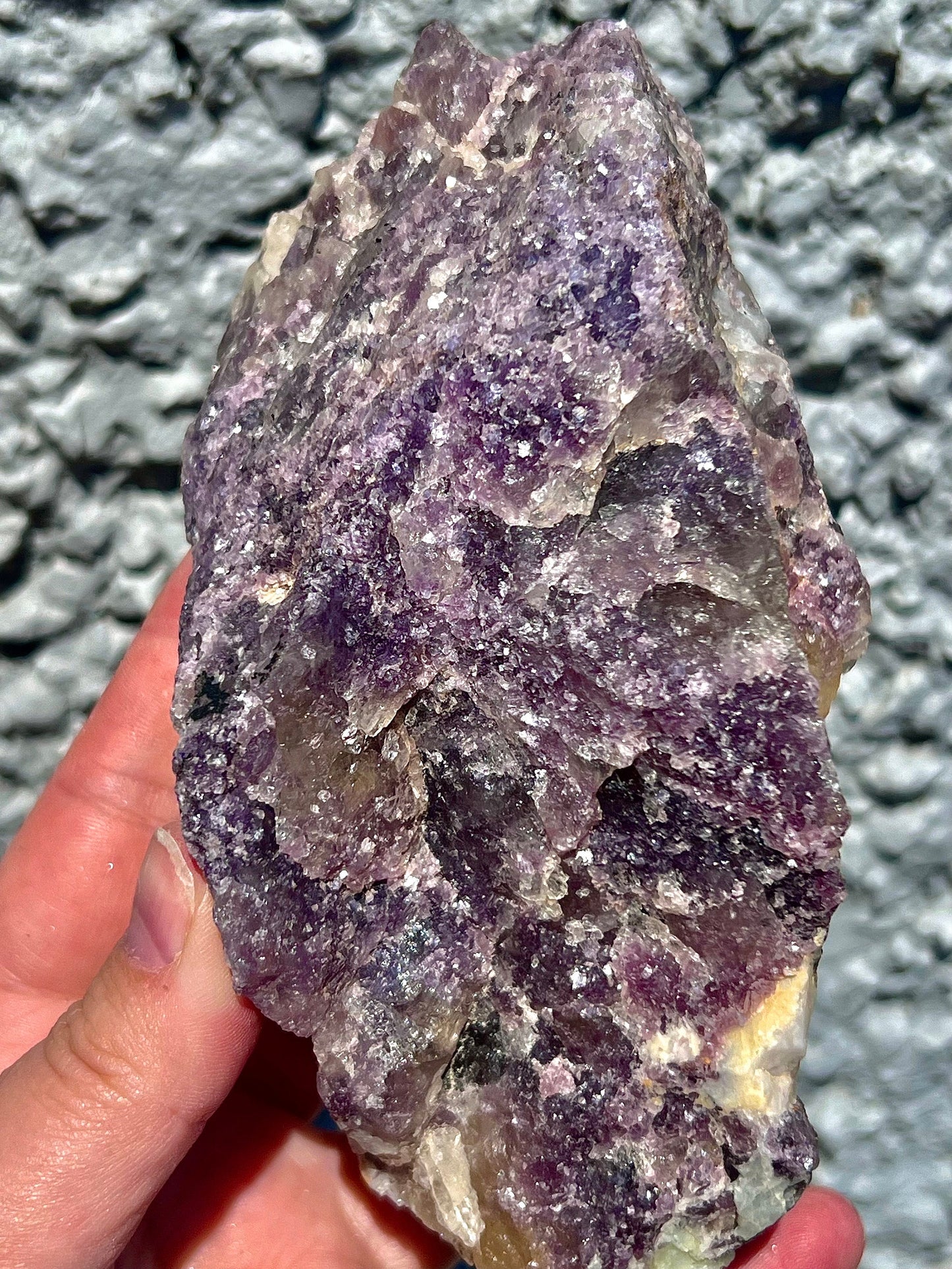 Rough lepidolite on stand