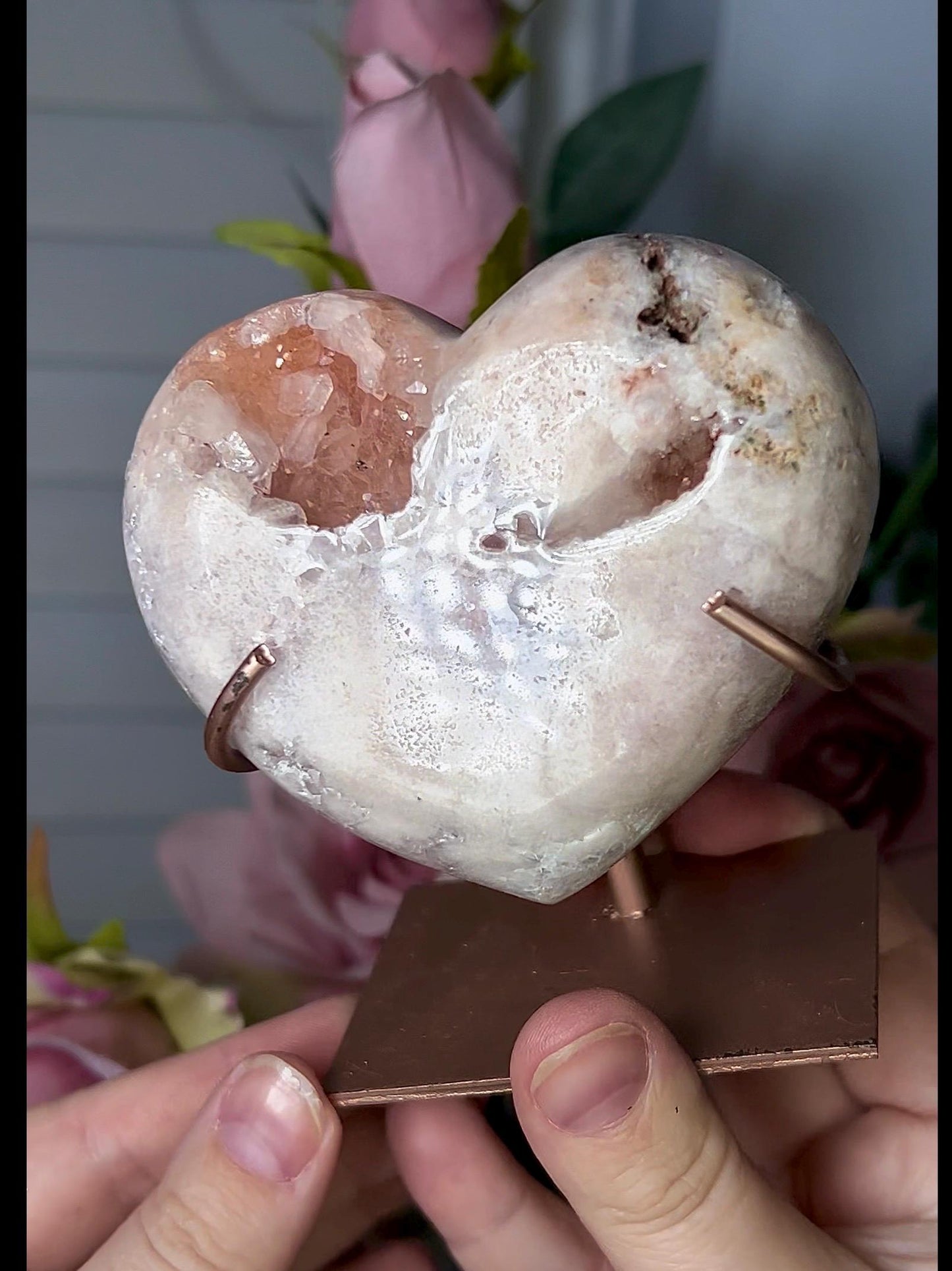 Beautiful, pink amethyst heart in peach tones with stand