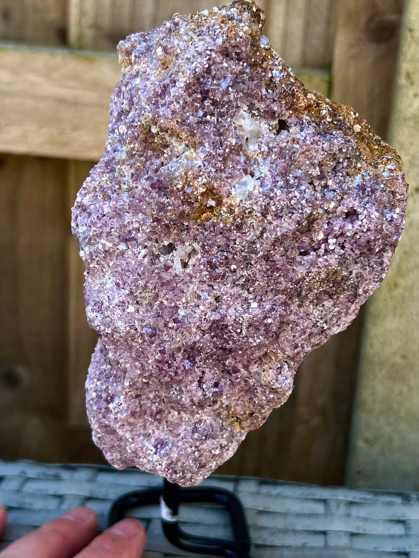Rough lepidolite on stand