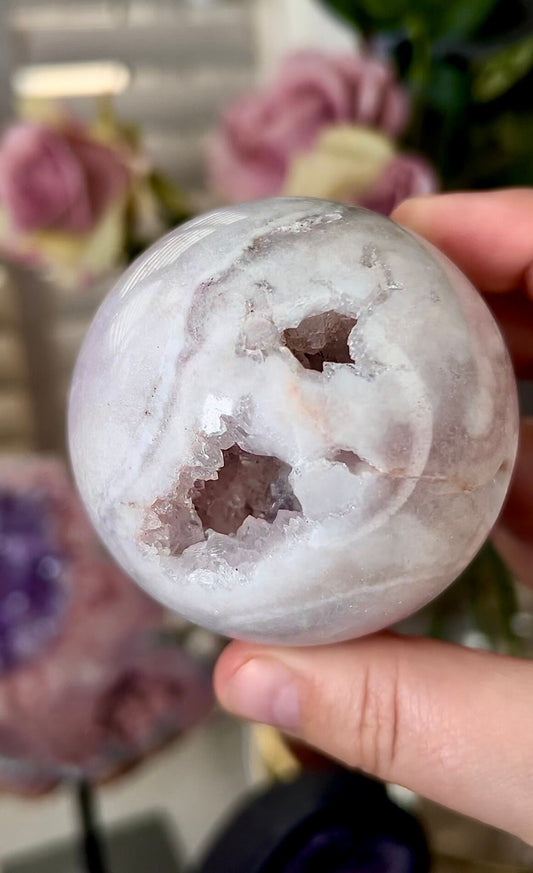 light pink amethyst sphere with chunky, druzy, teeth 380g